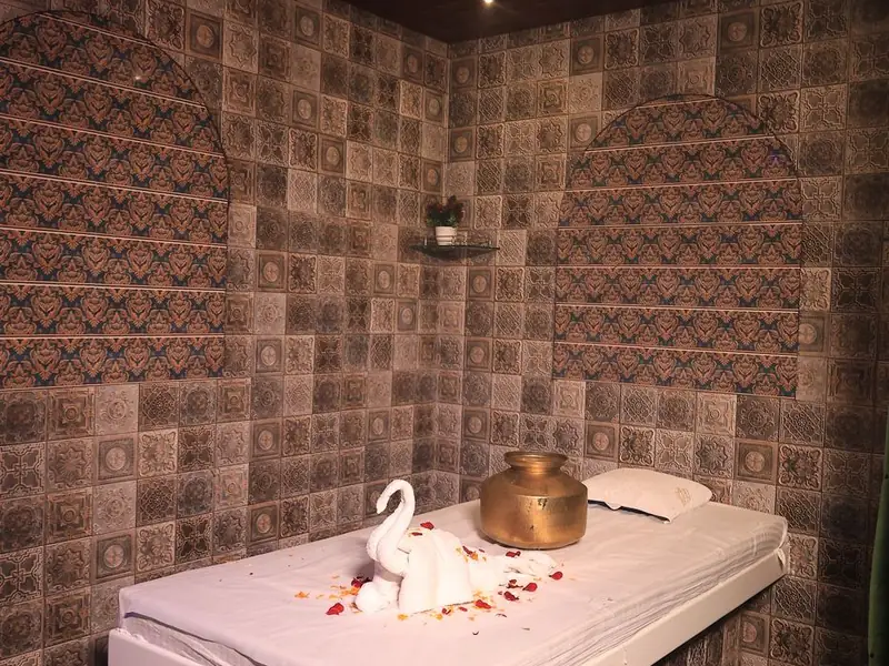 Patterned-tile Swedish massage room at Kyraa Luxury Spa, Surat